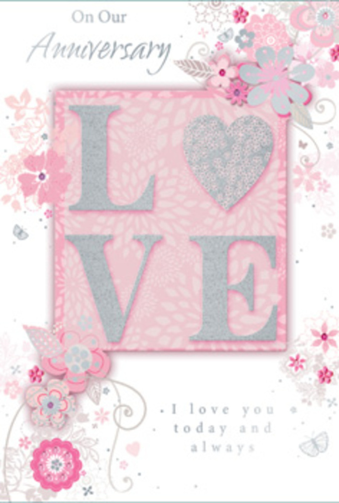 The image shows a tender anniversary card opened slightly, as if just placed on a table in a sun-bright Downe sitting room, letting the light play over its soft, romantic details. Dominating the front is the word LOVE, set in a sophisticated font and finished with frosted glitter that seems to shimmer delicately rather than dazzle. Each letter is embossed, giving a gentle three-dimensional feel, inviting the hand to rest on it in a moment of reflection. Surrounding this motif, wispy, hand-drawn blooms and airy sprays drift along the borders in shades of pink, lilac, and creamy ivory, their petals overlapping in a way that mimics a loosely gathered bouquet. Fine filigree lines twine between the flowers, forming slender stems and tendrils that curl like vines growing along garden fences around Downe's cottages. Tiny, almost-hidden butterflies and small leaf clusters nestle within the design, adding a sense of discovery, as if the eye could wander for a while and keep noticing new, delicate details. The message I love you today and always, or words very close to it, appears in simple, graceful script, set low on the card so it feels like the calm, steady echo of the bold central LOVE. The background holds a soft wash of blush and pale white, maintaining a light, airy balance that recalls the feeling of fresh flowers arranged by a careful local florist. The entire card resembles a hand-tied bouquet translated into paper: quiet, intentional, and perfect for marking an anniversary in Downe, whether exchanged over breakfast at home or presented alongside a fresh floral delivery.