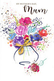 On this expressive Mother's Day card, a joyful, watercolour bouquet takes centre stage, painted with the easy confidence of someone who knows both flowers and feelings well. The arrangement is a lively mix of bold cerise, fuchsia, and raspberry-toned blooms, each softened by pools of colour and edged with deep indigo lines that suggest petals curling and overlapping. Between these richer notes, softer hues of lavender, dusky blue, and gentle apricot mingle, creating the same carefully balanced harmony a florist might aim for when crafting a seasonal bouquet for a home near Downe village green. Delicate golden strokes highlight certain petals and the hint of lush foliage, glistening like the last light of evening across a garden border. The flowers rise from a rounded, lightly washed vase in shades of pale blue and ivory, elegantly finished with a gold bow that looks almost tangible, evoking the feel of satin ribbon beneath the fingers. Around the main bouquet, spirited flecks of colour, tiny hearts, and small splashes of paint scatter across the white space, echoing the excitement of surprising Mum with flowers on her doorstep. The composition feels airy yet full of heart, like a handwritten note turned into colour and gesture. It conveys gratitude, warmth, and the intimate bond of family life in Downe, transforming a simple floral illustration into a tender, keepsake-style tribute for Mother's Day.